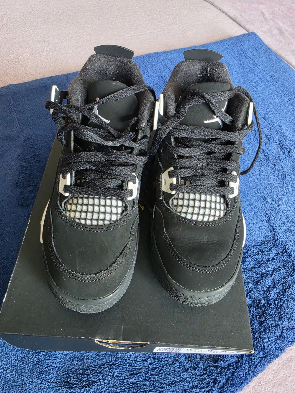 Nike Air Jordan 4 Kids Black and White Lace-Up Sneakers